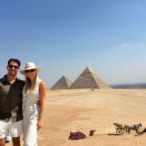 Standing before 7,000 years of history at the Great Pyramids of Giza.